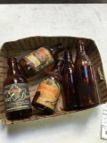 box of vintage group of beer bottles some with labels