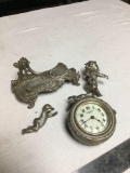 antique New Haven porcelain face cherub clock clock works but needs repair as-is