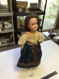 antique German bisque head doll with stand mark on back crack to head missing one finger
