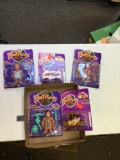 Group of five piece 1993 the Flintstones action figures in packages made by Mattel