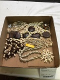 box of Hawaiian shell necklaces