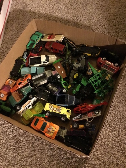 box of miscellaneous old cars