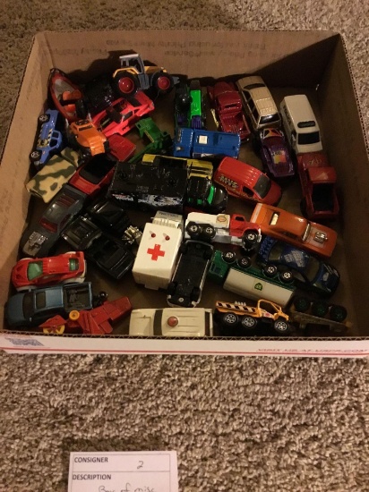 box of miscellaneous old cars