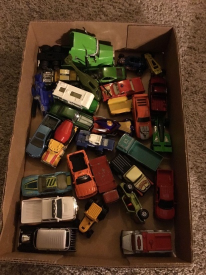 box of miscellaneous old cars