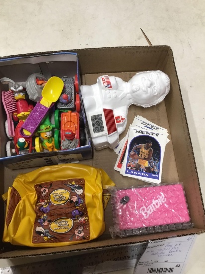 box of miscellaneous collectibles including Barbie camera