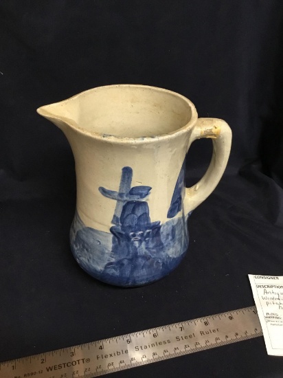 Antique blue and white windmill stoneware picture has old repair on rim measures 7 1/2 inch tall