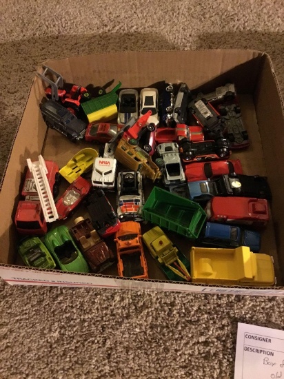 box of miscellaneous old cars