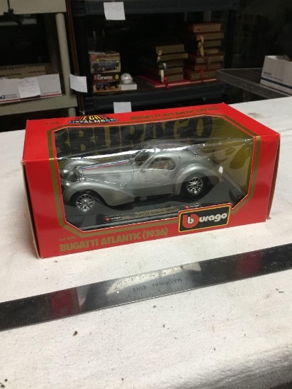 vintage diecast metal model with plastic parts by Burago inbox