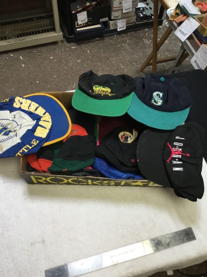 box of hats INCLUDING some Seattle Sonics, and Jordan
