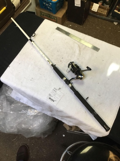 New Shakespeare tiger, spinning rod, and reel, never used