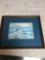 framed print of ladies at beach