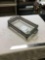 large glass casserole dish with metal footed holder