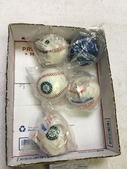 Group of 4 baseballs mariners