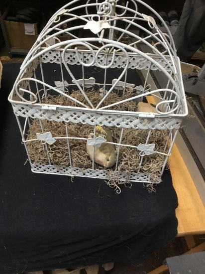 hanging white metal birdcage with porcelain birds