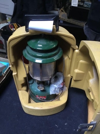 vintage 1973 Colman lantern with hard shell case