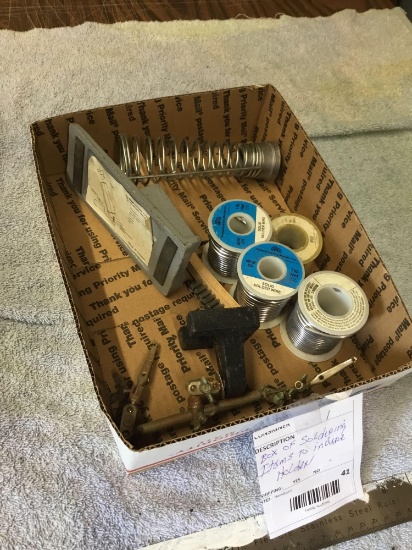 box of soldering items to include holder