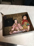 vintage two piece Asian dolls one has stand