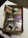 box of various group of sealed CDs