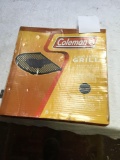 Coleman cast iron grill, set sealed in box