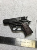 plastic toy clicker, gun