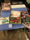 box of old magazines, model, teetimes, and antique automobile 1970s
