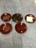 Stack of vintage ruby saucers