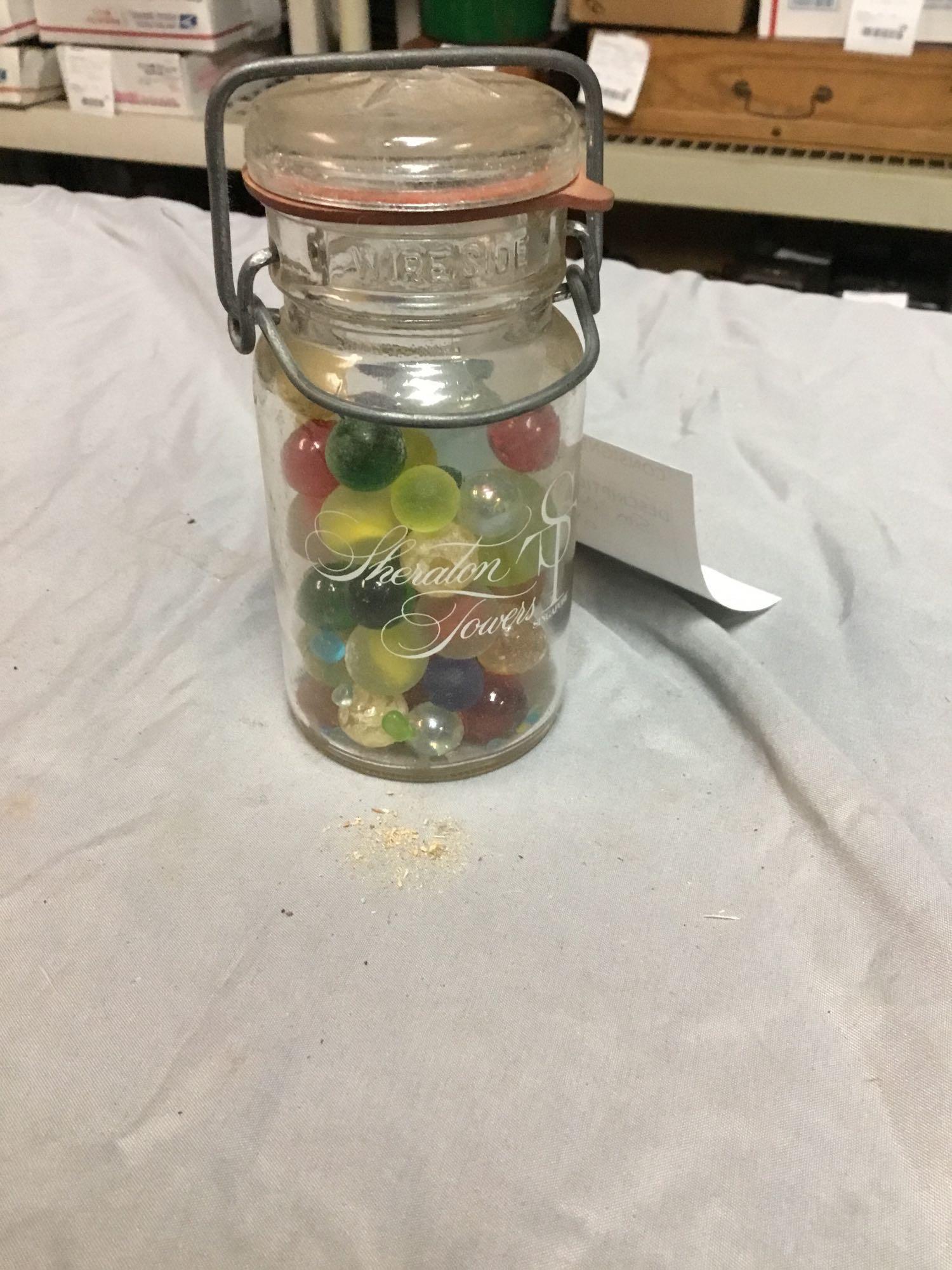small canning jar with marbles Proxibid