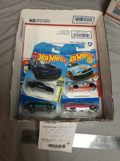 Group of four hot wheels, diecast cars sealed
