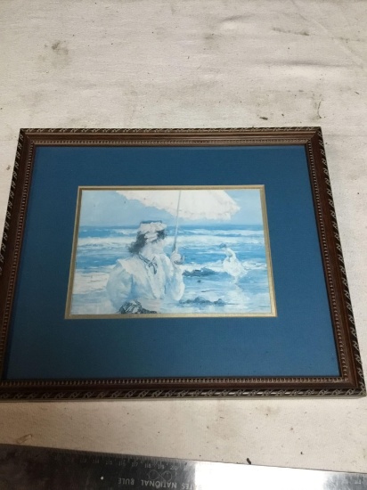 framed print of ladies at beach