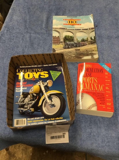three piece vintage, sports almanac, and HO catalog