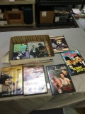 box of movies, most never played