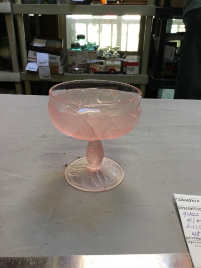 vintage pink glass compote with what looks like lily pad design