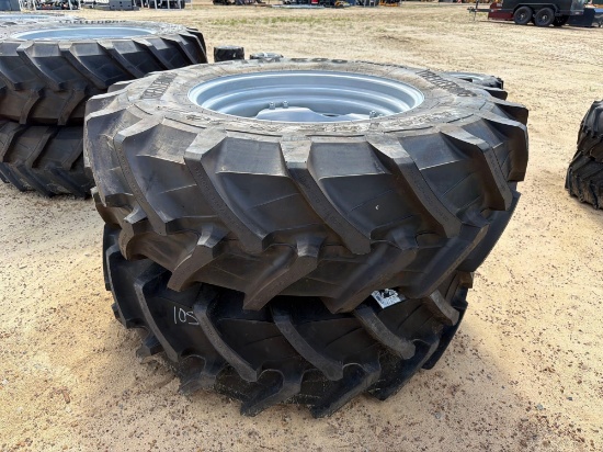 UNUSED (2) 16.9R30 TIRES ON 8 LUG RIMS