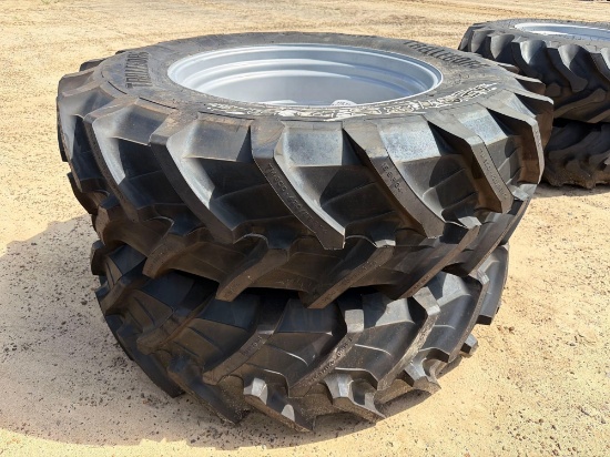 UNUSED (2) 16.9R34 TIRES ON 8 LUG RIM