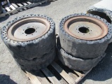 (4) Used 33x12x20 Skid Steer Solid Wheels & Tires