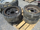 (4) Used 10-31 Solid Bobcat Tires & Wheels