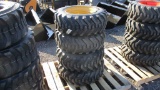 (4) New CAT/ Case 10-16.5 Wheels & Tires