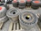 (4) Used  Solid 33 x 12 x 16 Skid Steer Tires
