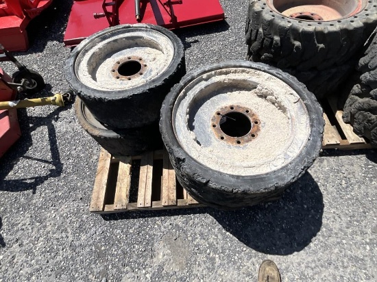 (4) Used 12-16.5 Solid Bobcat Wheels / Tires