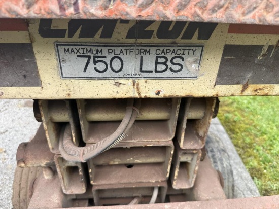 **AS IS**JLG Commander Scissor Lift