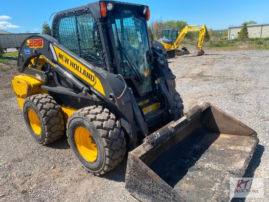 New Holland 228 skid steer loader with cab and GP bucket, heat, A/C, hand and foot controls, 1860
