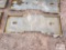 Skid loader mounting plate
