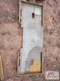 Skid loader mounting plate