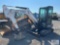 2012 Bobcat E32 mini excavator, 12in digging bucket, quick coupler, cab, heat, backfill blade, 3658