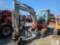 Takeuchi TB240 mini excavator, cab, heat, A,C, hydraulic thumb, 24in digging bucket, backfill blade,