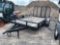 1994 PJ 12ft single axle utility trailer with mesh gate and side rail ramps, 3000lb GVW, has a