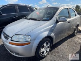 2006 Chevy Aveo LS 4 door sedan, standard transmission, A/C, runs with jump, 94,196 mi. Bill Of Sale