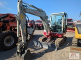 Takeuchi TB240 mini excavator, cab, heat, A,C, hydraulic thumb, 24in digging bucket, backfill blade,