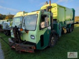 2009 CCC packer truck, Expert 2000 packer body, dual operator seats, 31 yd, automatic transmission,