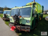 2009 CCC packer truck, Expert 2000 packer body, dual operator seats, 31 yd, automatic transmission,